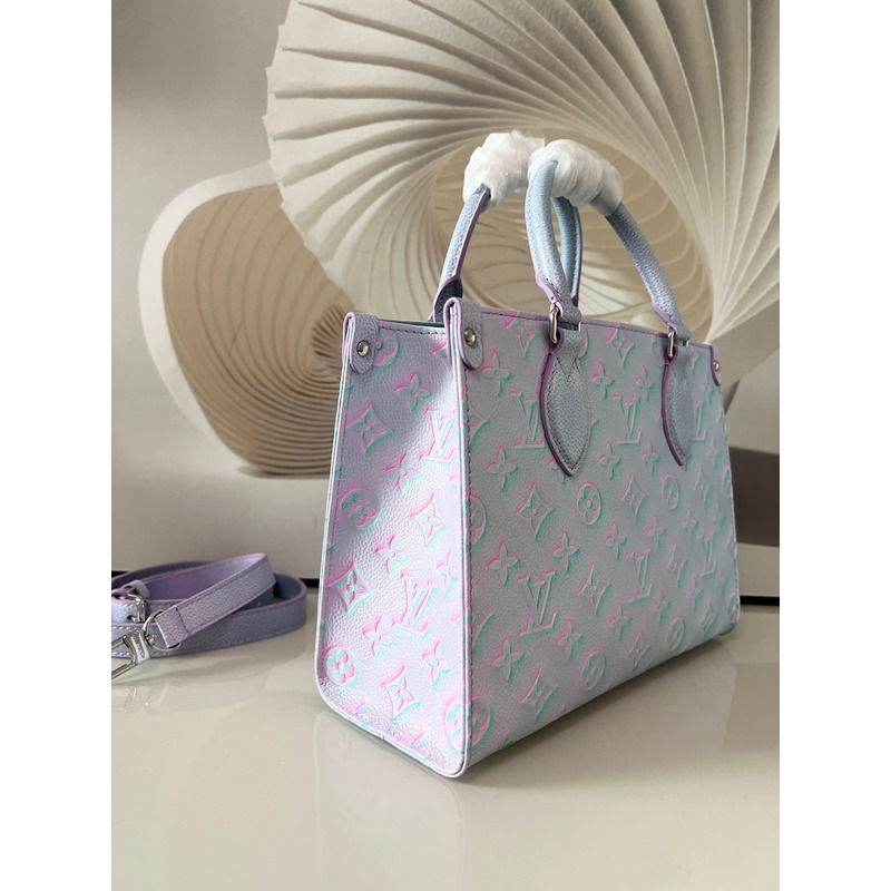 l**is V*t*n green, and blue summer stardust onthego pm silver hardware