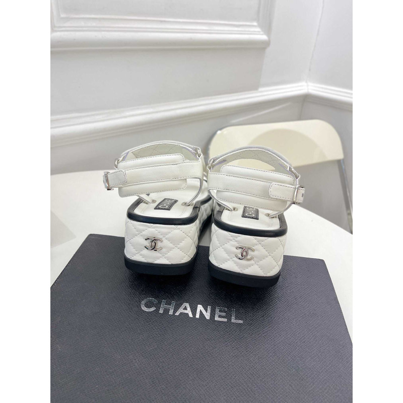 Ch*el black leather sandals in white