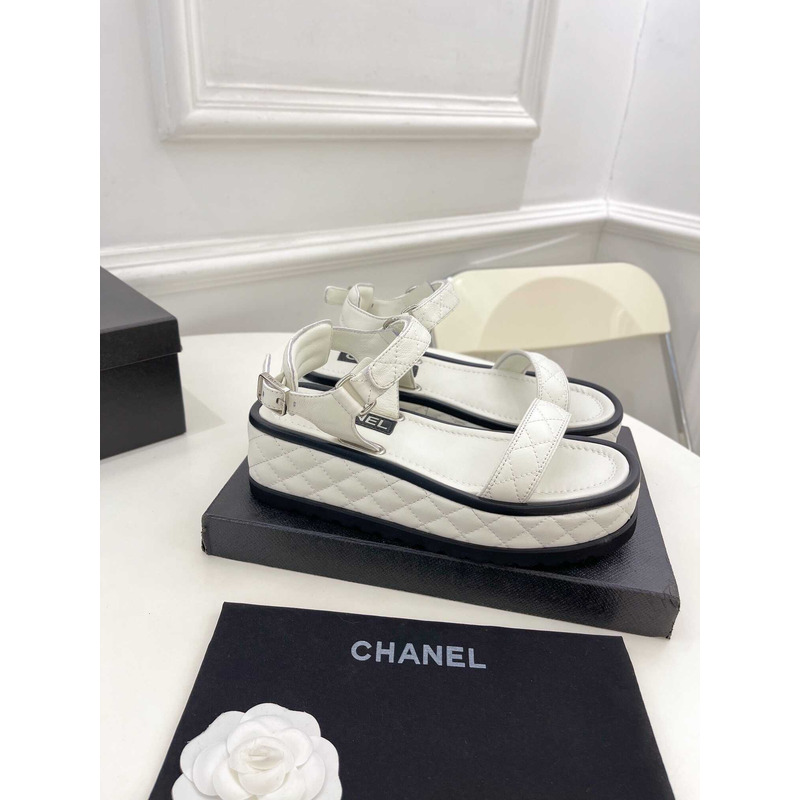 Ch*el black leather sandals in white