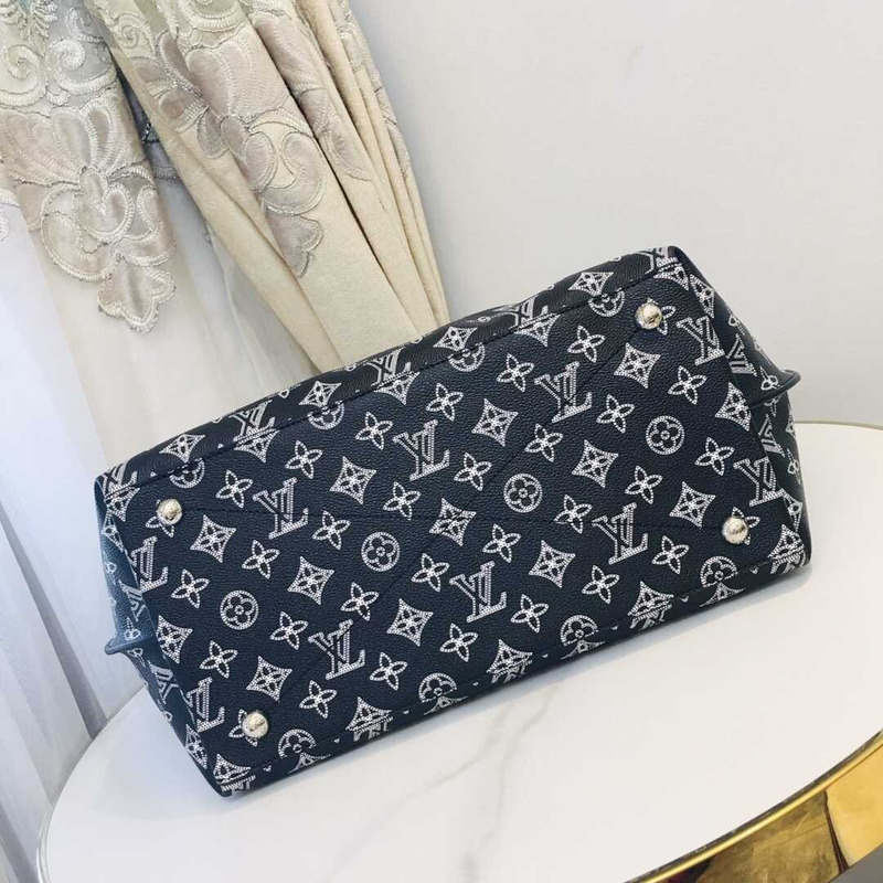 l**is V*t*n m21299 carmel mahina leather bag