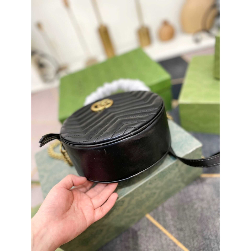 G*u*i black marmont round cross bag