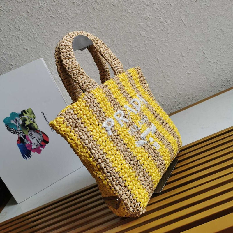 Pra*a large raffia tote bag tan/yellow