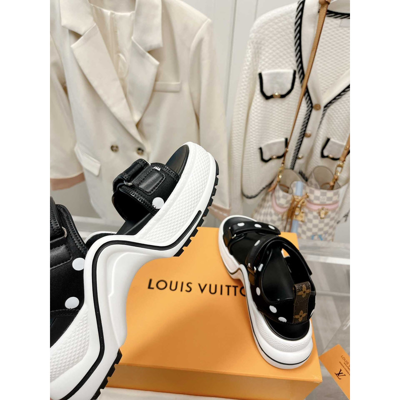 l**is V*t*n archlight sandal black and white