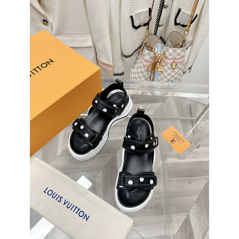 l**is V*t*n archlight sandal black and white