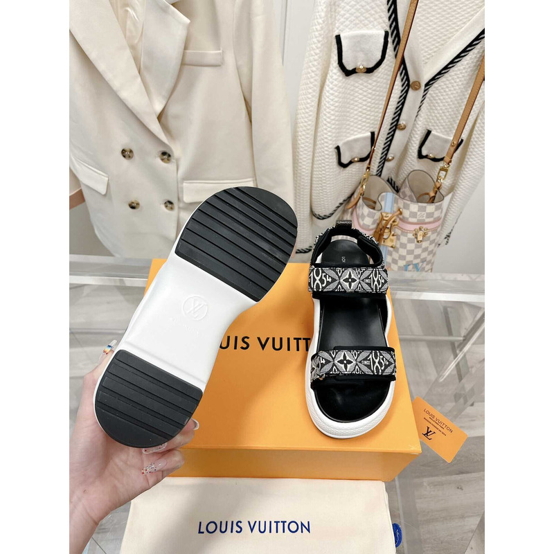 l**is V*t*n archlight sandal black and white