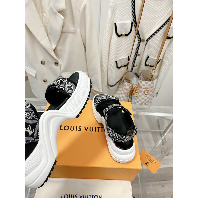 l**is V*t*n archlight sandal black and white