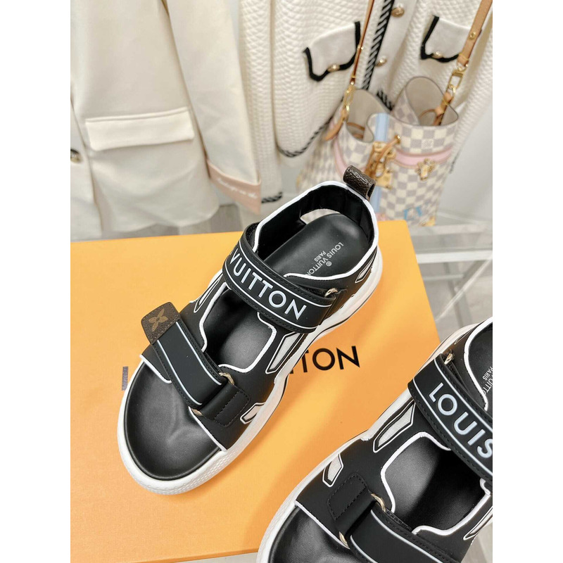 l**is V*t*n archlight sandal black and white