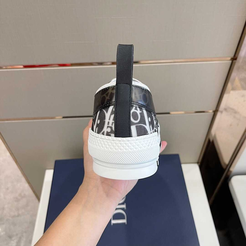D*or essentials b23 low-top sneaker black and white D*or oblique canvas