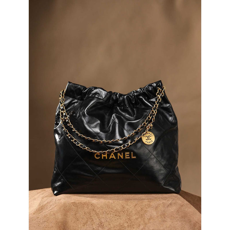 Ch*el 22 handbag black shiny calfskin & gold-tone metal