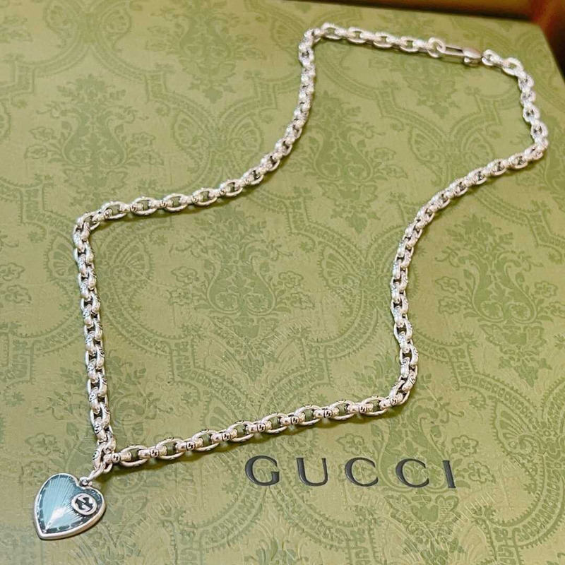 G*u*i blue heart necklace