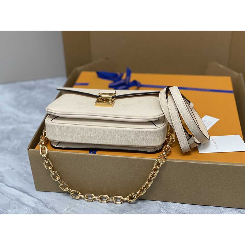 l**is V*t*n pochette métis east west white