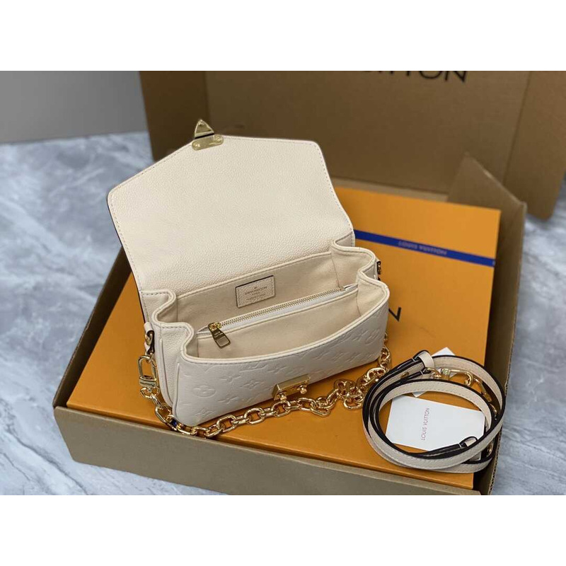 l**is V*t*n pochette métis east west white