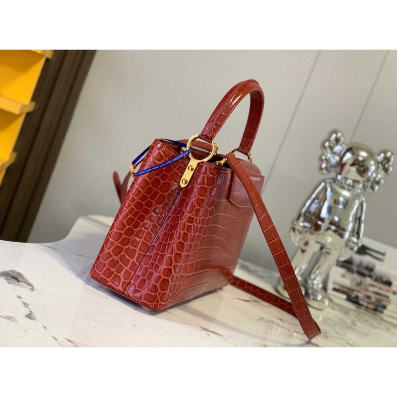 l**is V*t*n capucines mm crocodile skin bags