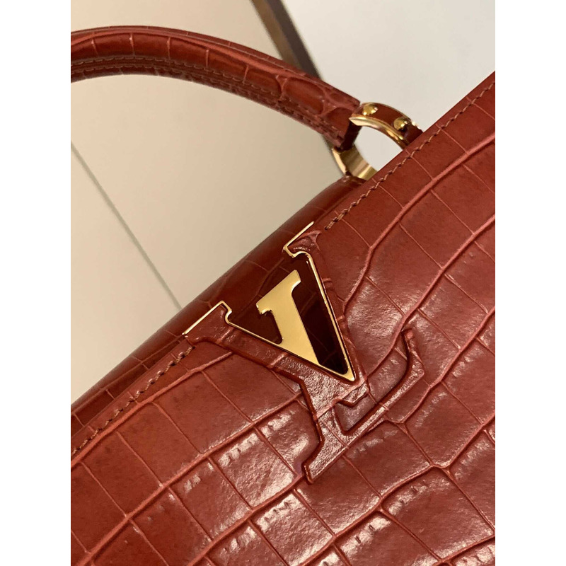 l**is V*t*n capucines mm crocodile skin bags