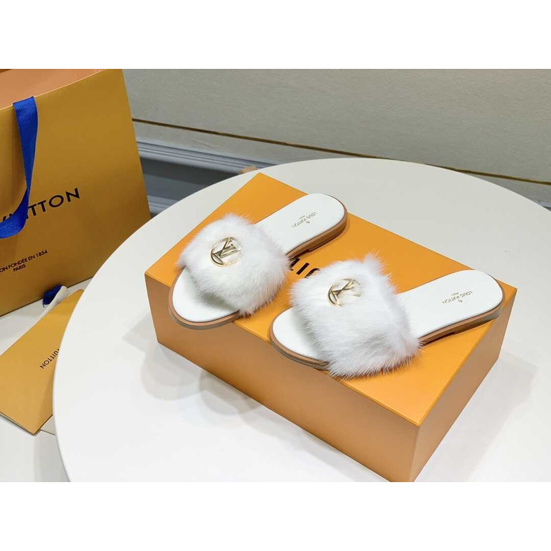 l**is V*t*n white furry slippers