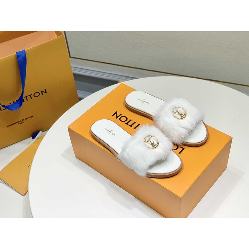 l**is V*t*n white furry slippers