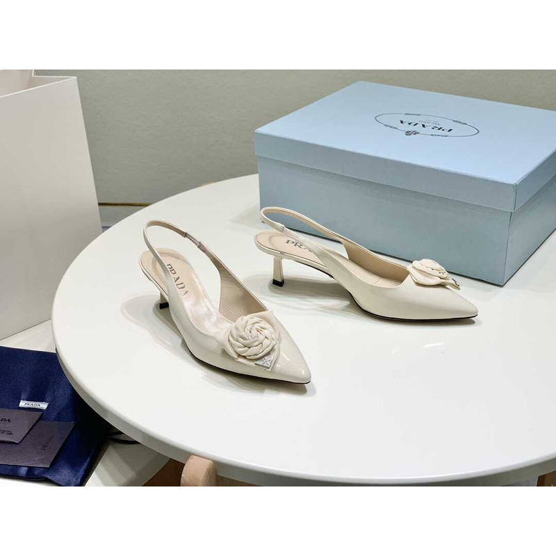 Pra*a white patent leather slingback