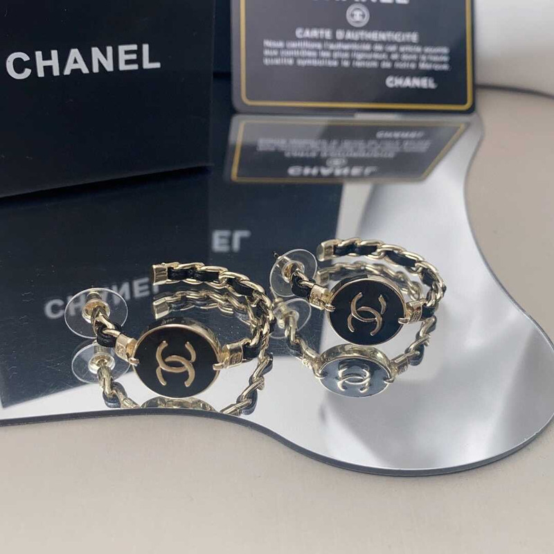 Ch*el metal cc earrings gold and black