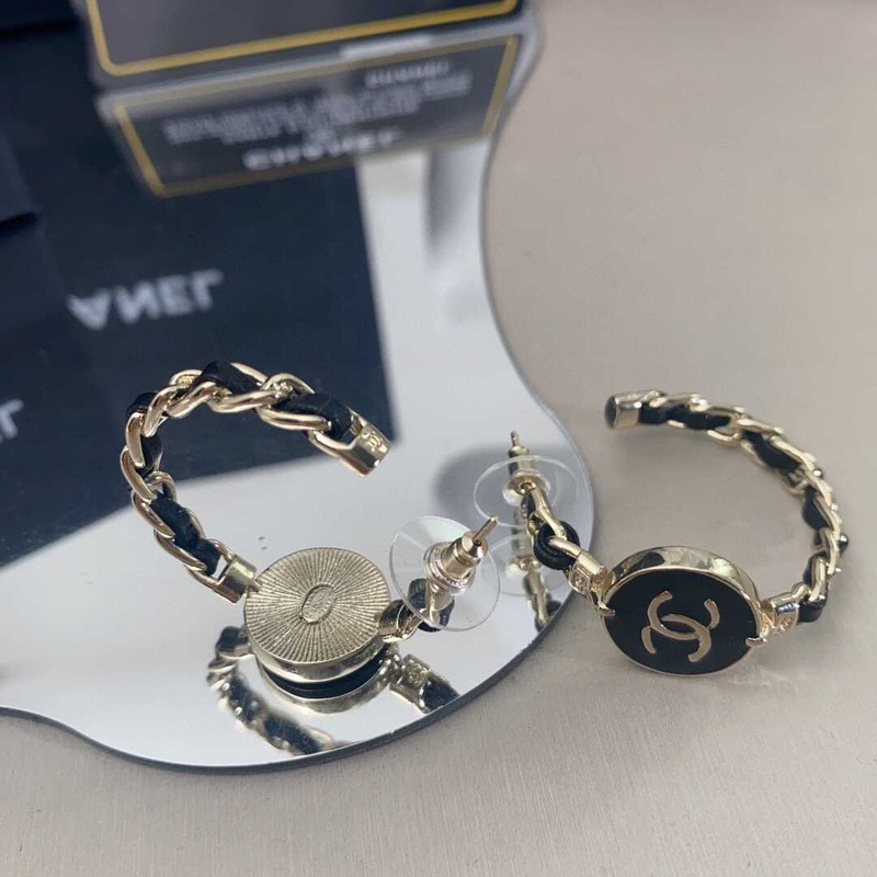 Ch*el metal cc earrings gold and black