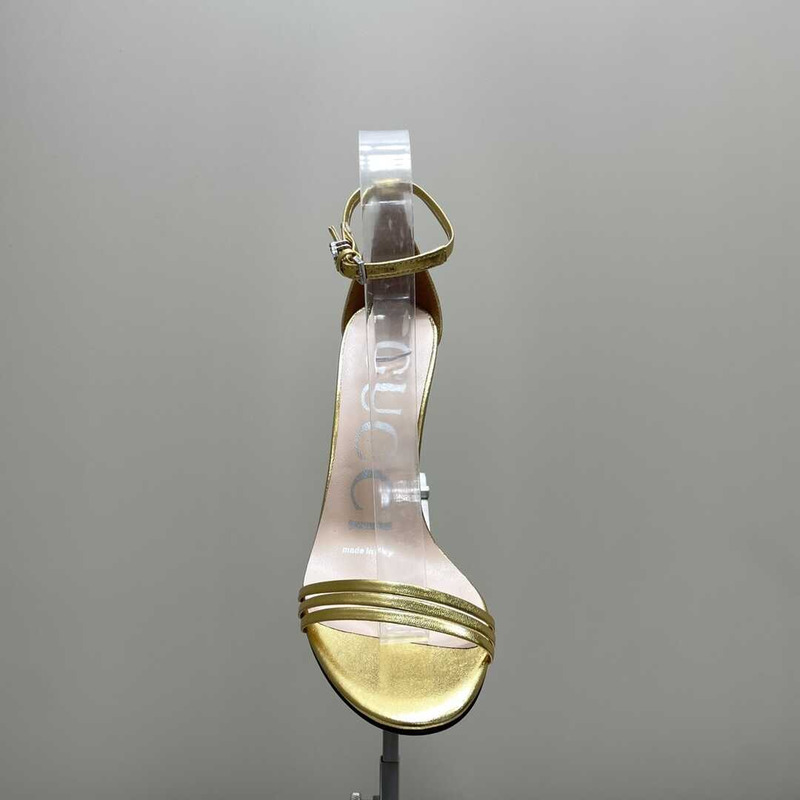 G*u*i stiletto heels gold