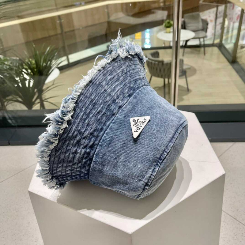 Pra*a denim bucket hat with daisy blue