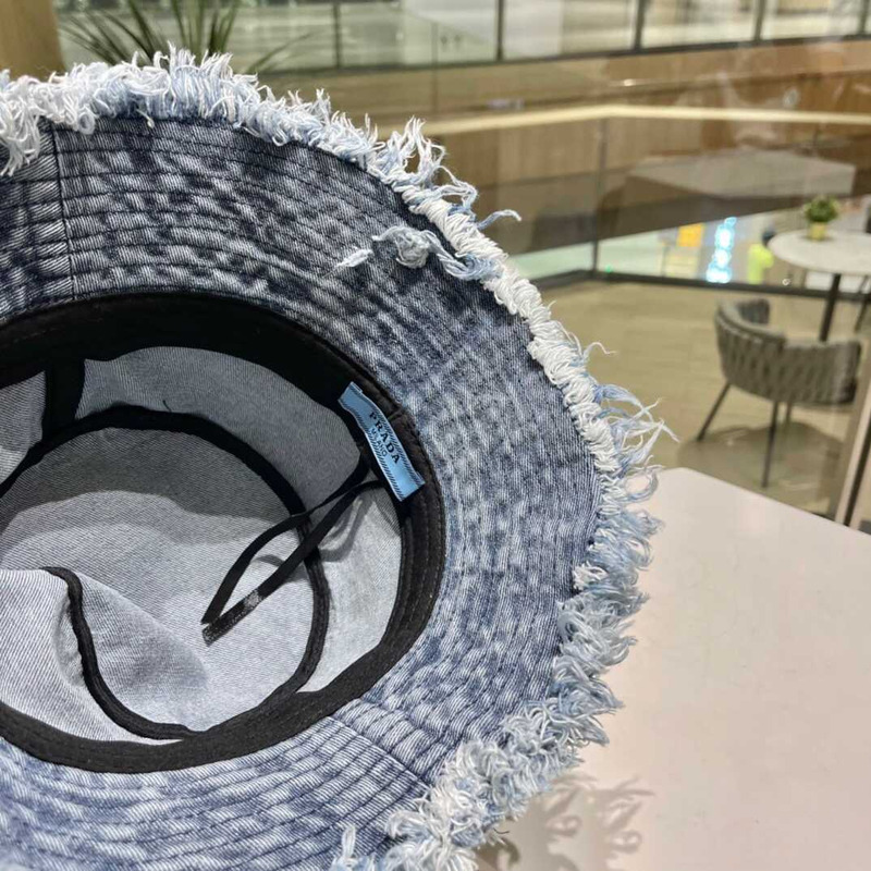 Pra*a denim bucket hat with daisy blue