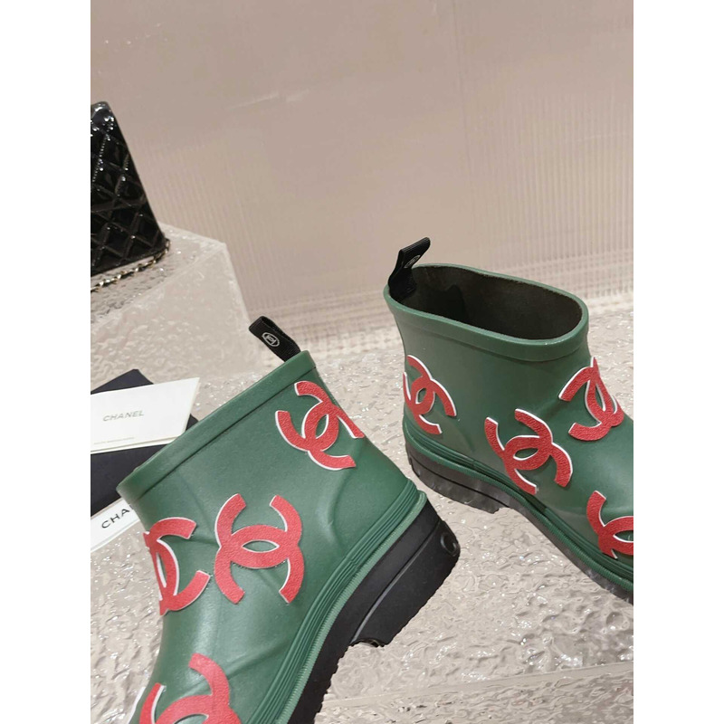 Ch*el short rain boots green and red logo