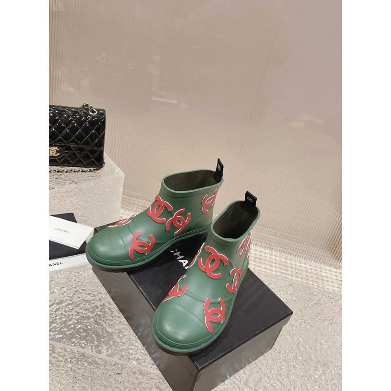 Ch*el short rain boots green and red logo