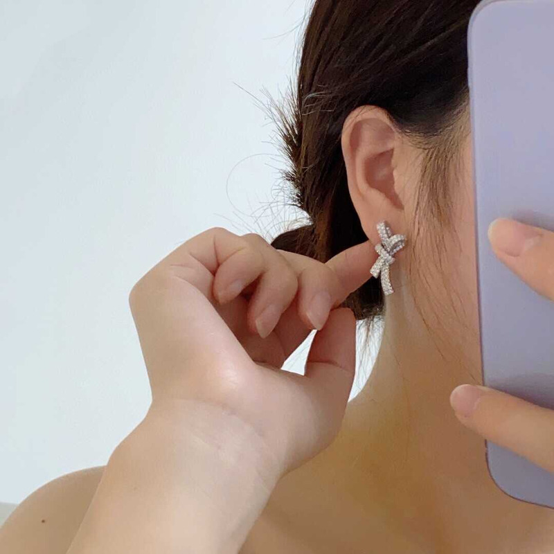 ch*el bow tie sparkling Di*m*nd earrings