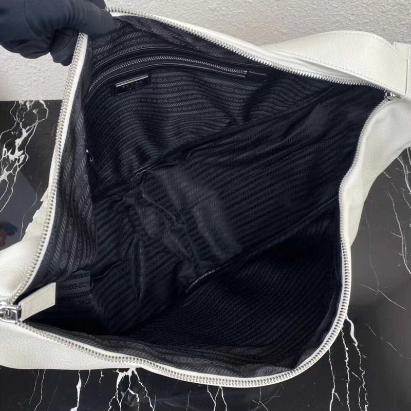 Pra*a pre-owned triangle logo embossed shoulder bag white