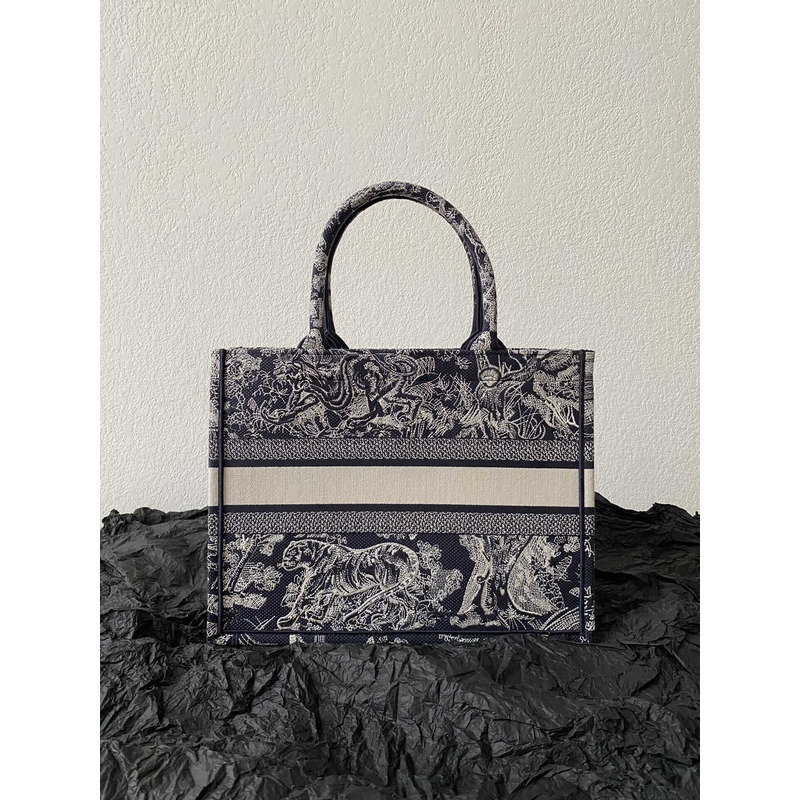 D*or medium book tote ecru toile de jouy reverse embroidery blue