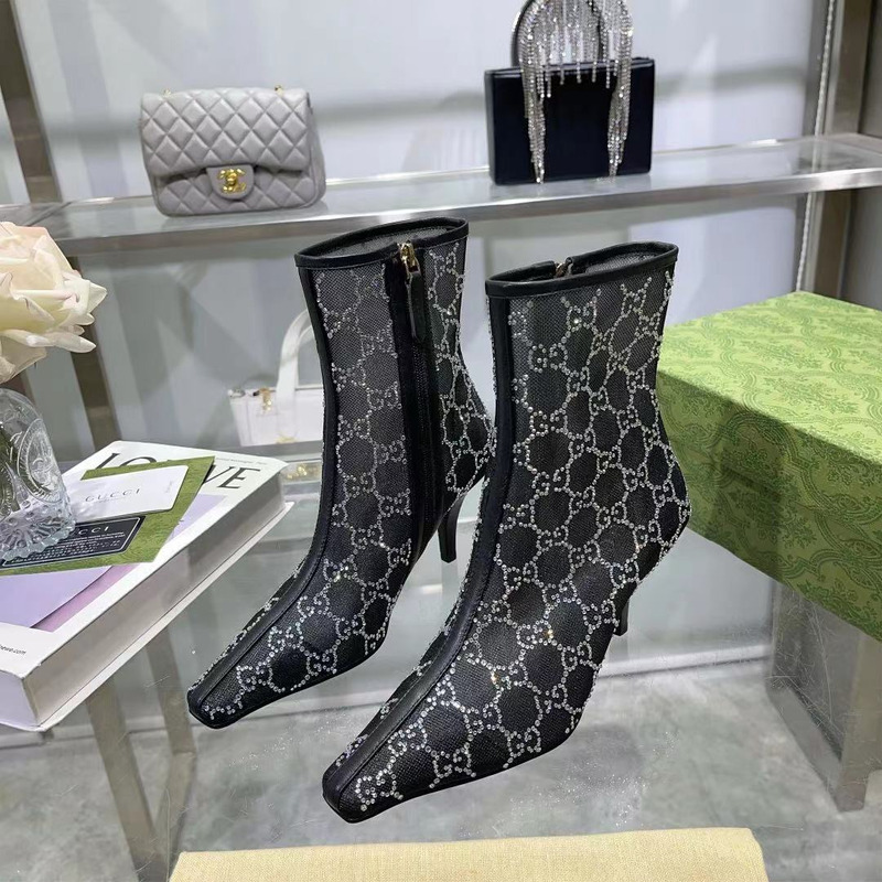 G*u*i women`s gg mid-heel black boot