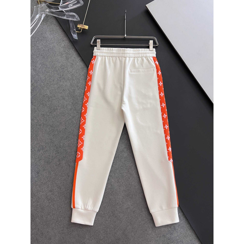 l**is V*t*n hoodie and pants orange