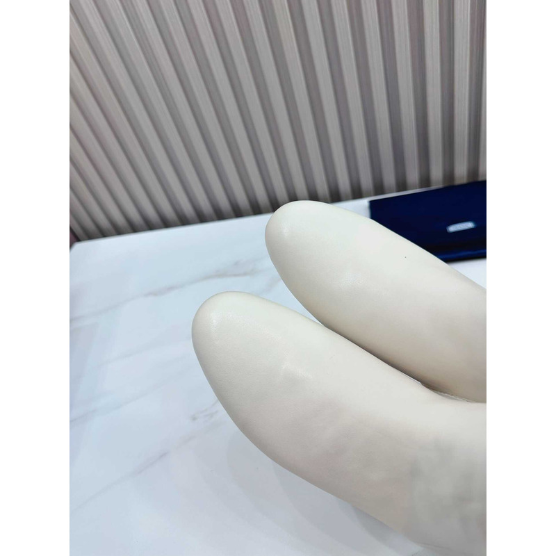 Pra*a leather ankle boots white