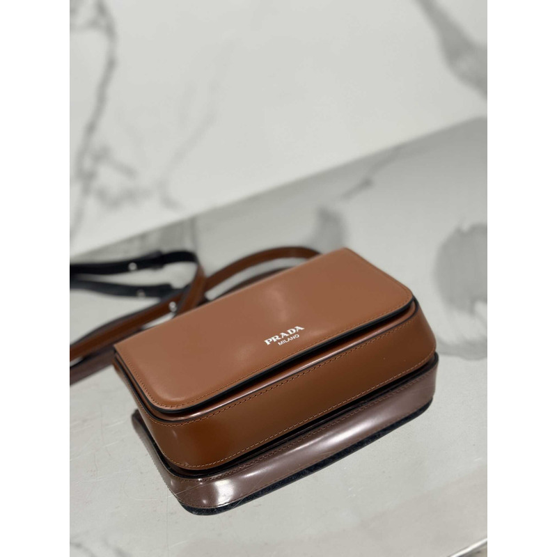 Pra*a brushed leather mini-bag with shoulder strap brown
