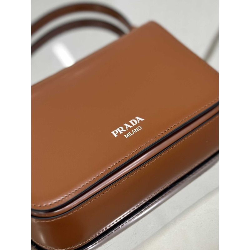 Pra*a brushed leather mini-bag with shoulder strap brown