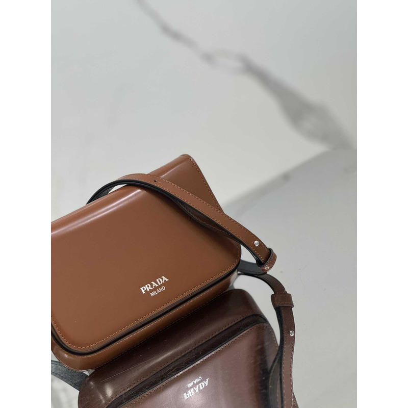 Pra*a brushed leather mini-bag with shoulder strap brown
