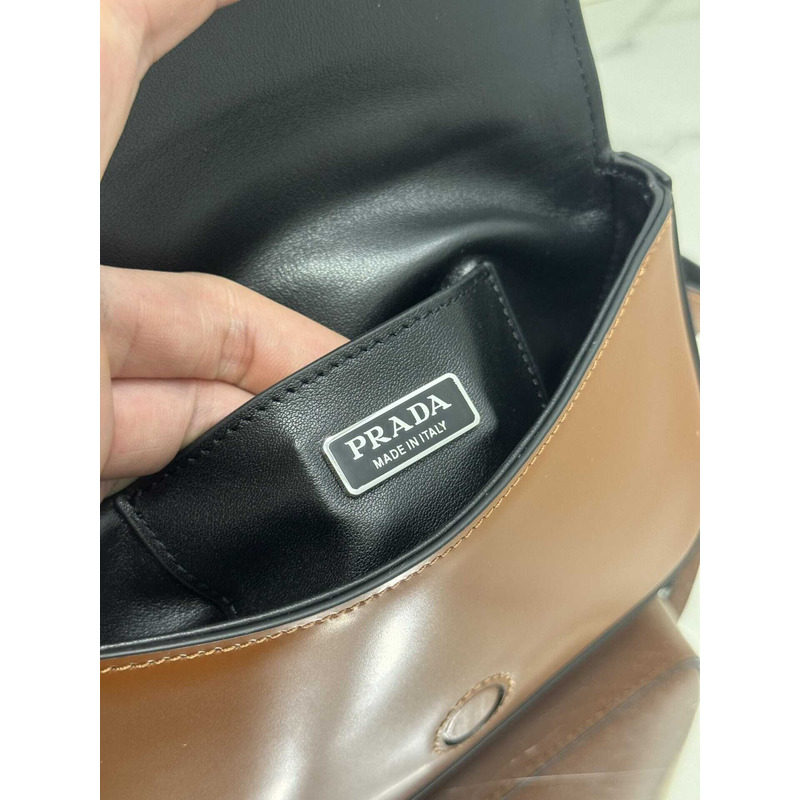 Pra*a brushed leather mini-bag with shoulder strap brown