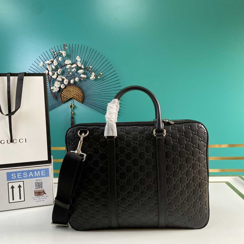 g*u*i gg S*p*e embossed leather briefcase black