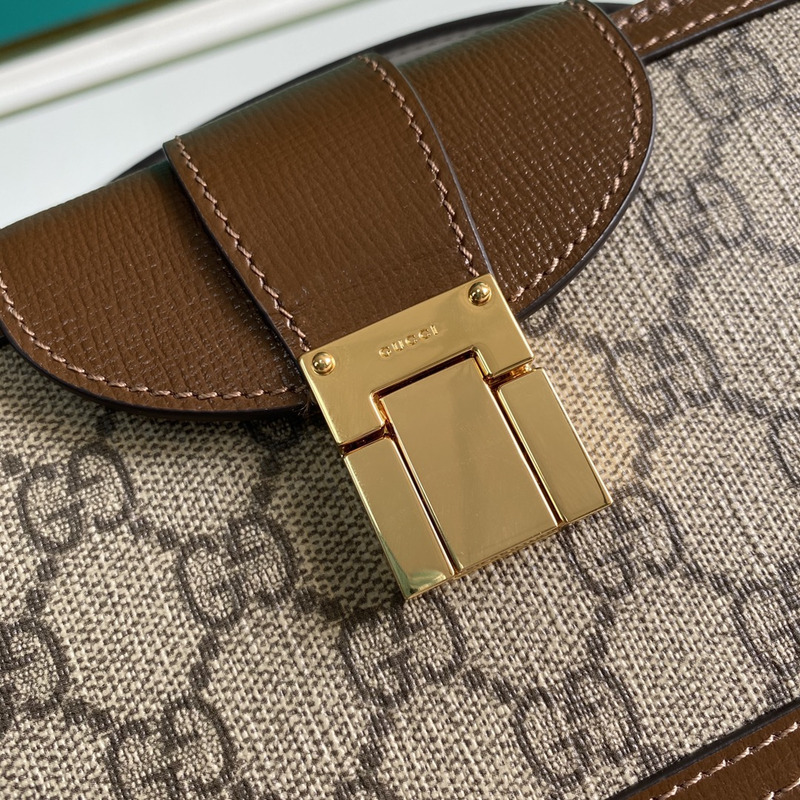 g*u*i gg S*p*e mini bag with clasp closure brown