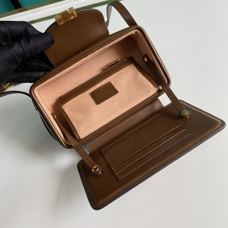 g*u*i gg S*p*e mini bag with clasp closure brown