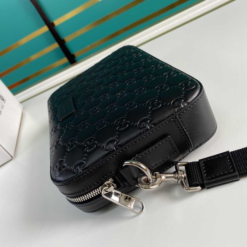 g*u*i gg S*p*e embossed clutch black