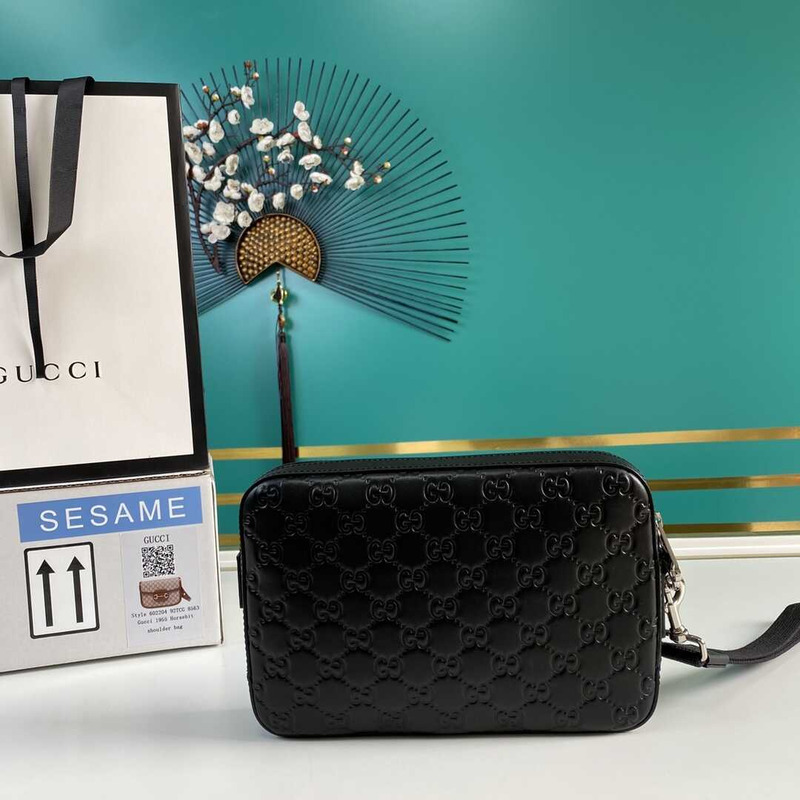 g*u*i gg S*p*e embossed clutch black