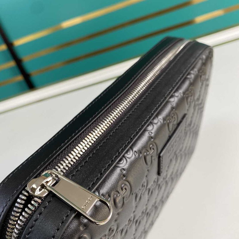 g*u*i gg S*p*e embossed clutch black