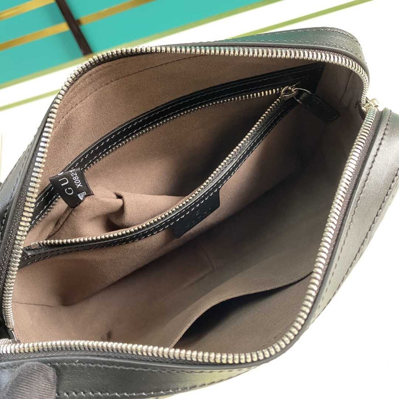 g*u*i gg S*p*e embossed clutch black