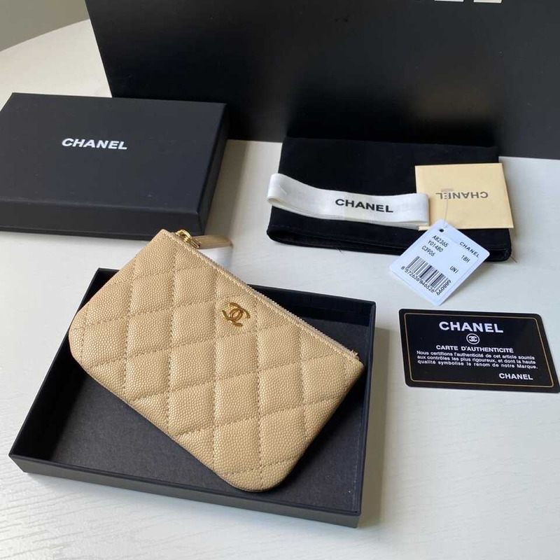 Ch*el Ch*el caviar quilted zipped key holder case beige