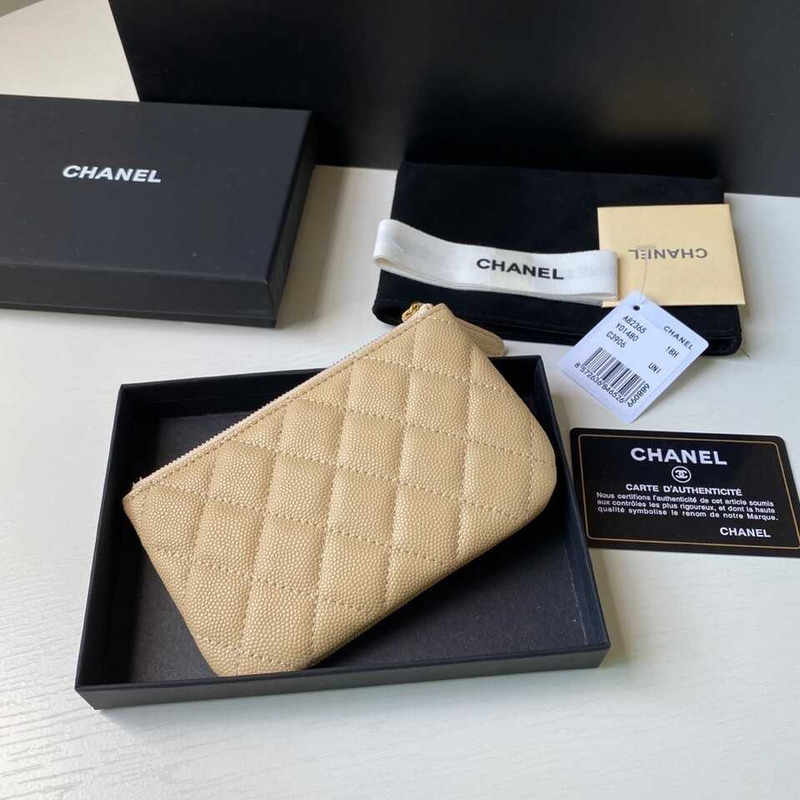 Ch*el Ch*el caviar quilted zipped key holder case beige