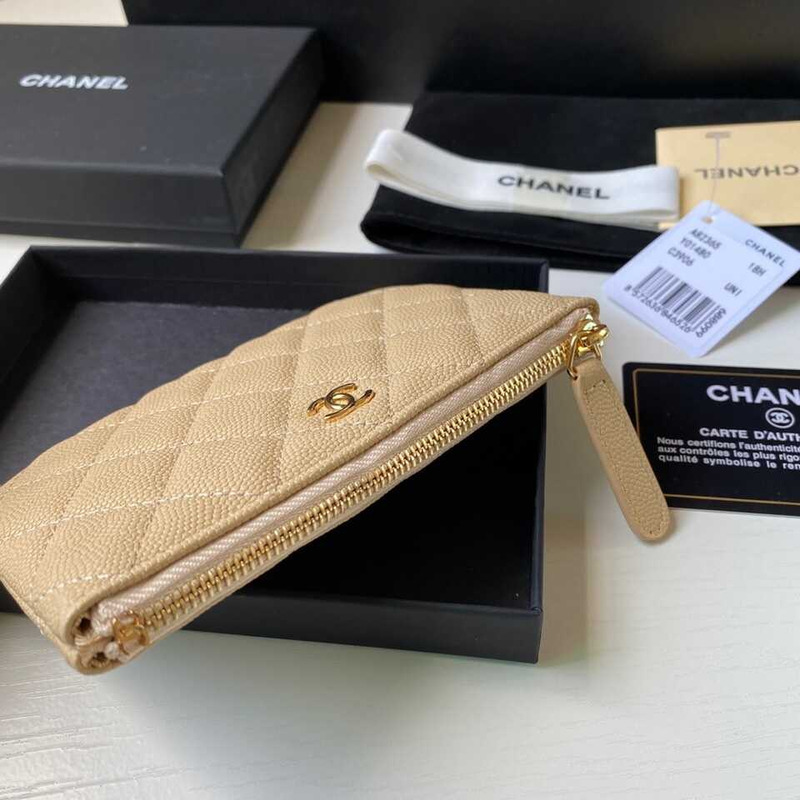 Ch*el Ch*el caviar quilted zipped key holder case beige