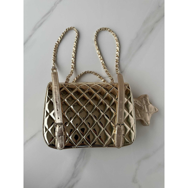 Ch*el backpack & star coin purse metallic mirror calfskin, metallic lambskin & gold-tone metal light gold