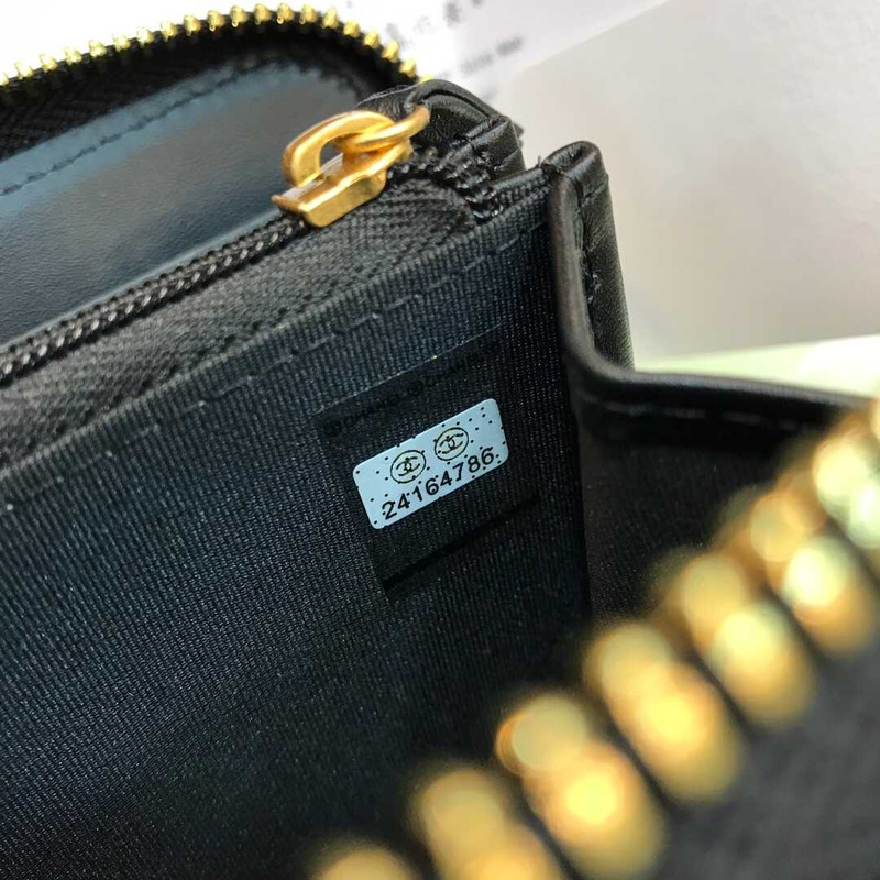 Ch*el boy Ch*el round long wallet lambskin black